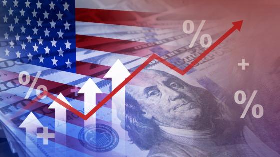 US flag, dollar bills, chart and percentage symbols
